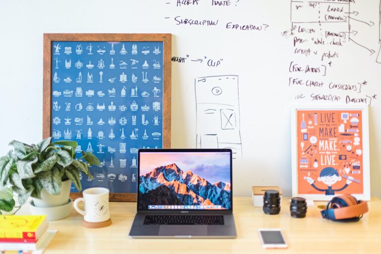 Laptop and whiteboard in remote work location